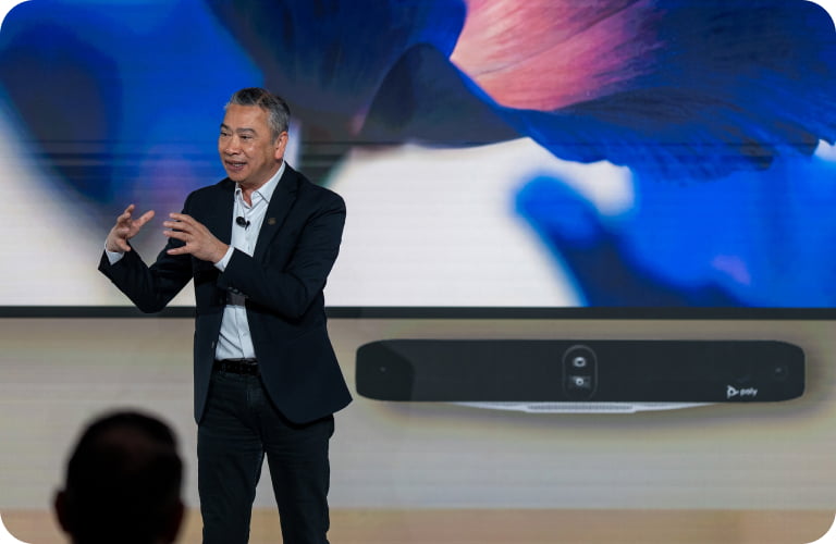 Tuan Tran presenting on stage at HP Imagine.