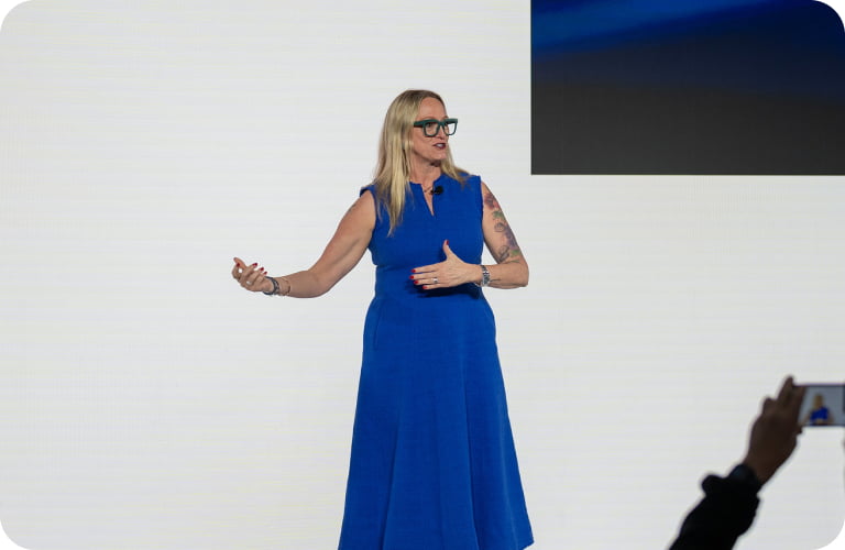 Anneliese Olson presenting on stage at HP Imagine.